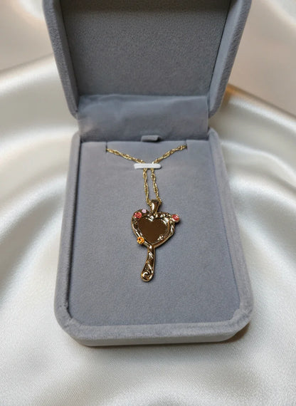 Heir of Venus Bundle blessed Venusian necklace displayed in a jewelry box on soft satin fabric.