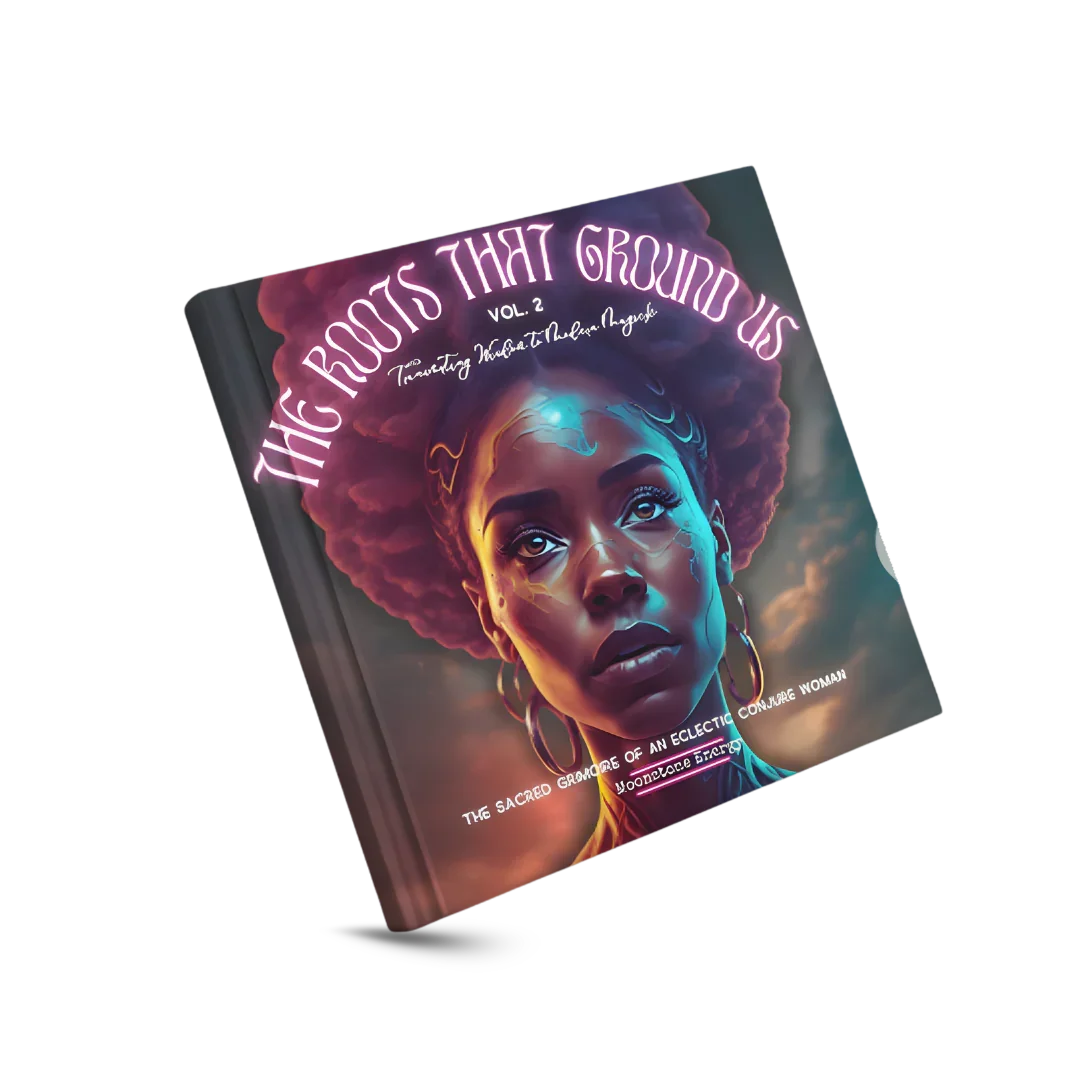 The Roots That Ground Us Vol. 2 (Transmuting Wisdom Into Modern Magick) book cover featuring a powerful woman portrait.
